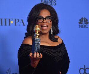 A photo of oprah winfrey with an award