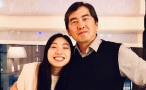 A photo of Awkwafina with her father
