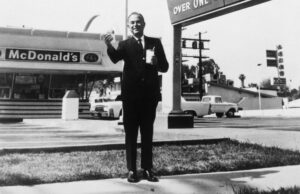 McDonald's Founder Raymond Posing Outside One Of His Restaurants.