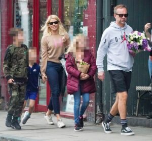 A Paparazzi Photo of Dan With His Wife And Kids.